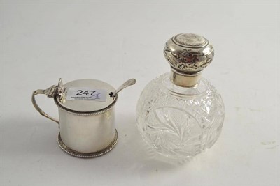 Lot 247 - A Victorian silver mustard pot and spoon, a silver topped scent bottle and a Lexon pen set