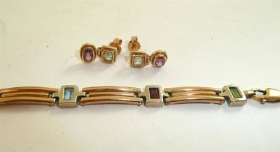 Lot 337 - A gem set bracelet (a.f.) and a pair of 9ct gold gem set earrings