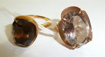 Lot 338 - Two 9ct gold smokey quartz rings