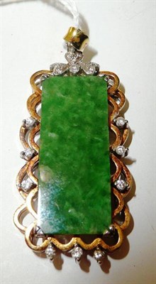 Lot 339 - A jade and diamond set pendant stamped '14K'