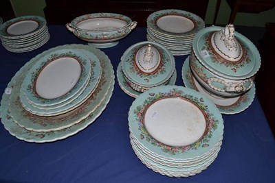 Lot 356 - An opaque porcelain dinner service with turquoise and floral borders