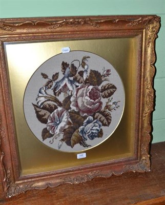 Lot 396 - Framed circular woolwork of foliate design