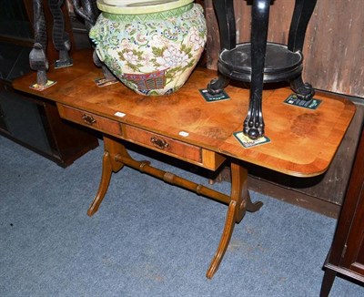 Lot 431 - A reproduction burr walnut sofa table