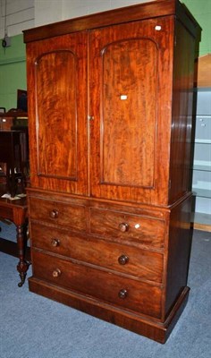 Lot 434 - A Victorian mahogany linen press with hanging space