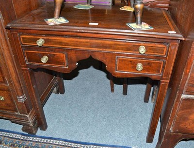 Lot 457 - A 19th century mahogany crossbanded lowboy