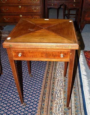 Lot 463 - An Edwardian mahogany envelope card table