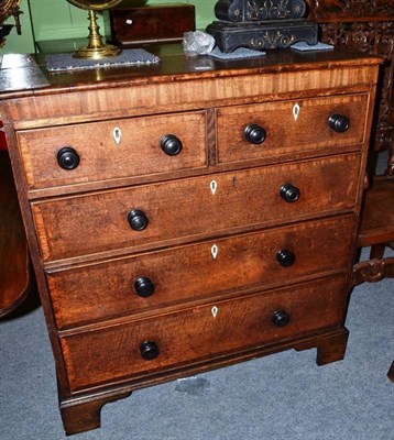 Lot 475 - A 19th century oak four height chest