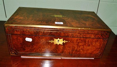 Lot 476 - A brass bound walnut writing slope lacking interior