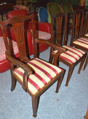 Lot 480 - A set of six mahogany dining chairs including two carvers