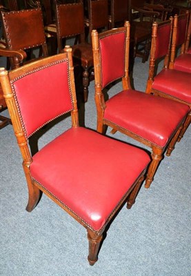 Lot 482 - A matched set of six Victorian oak chairs with upholstered seats and backs