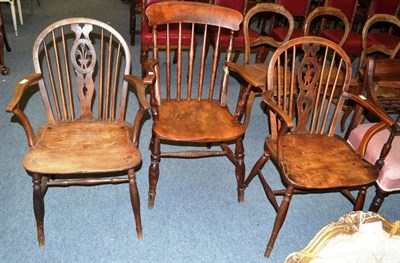 Lot 483 - A pair of elm and ash armchairs and another chair