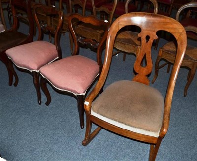 Lot 485 - A Victorian mahogany rocking chair, a pair of Victorian mahogany balloon back dining chairs, a...