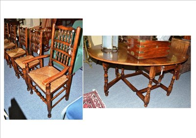 Lot 495 - Titchmarsh and Goodwin oak dining table and six chairs (4+2)