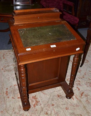 Lot 504 - A small mahogany Davenport