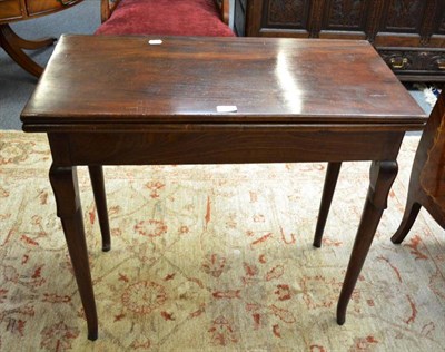 Lot 505 - A 19th century mahogany fold over tea table