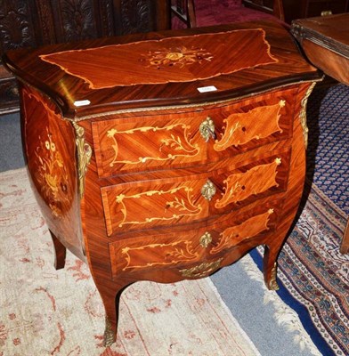 Lot 506 - A reproduction bombe three height chest