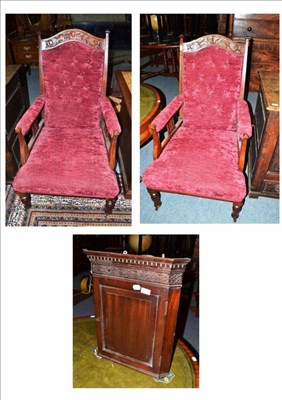 Lot 511 - A pair of Edwardian red upholstered armchairs with button backs and a small mahogany corner...