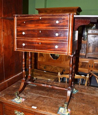 Lot 519 - 19th century mahogany work table with ivory handles