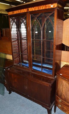 Lot 539 - An inlaid mahogany bookcase top on a later associated base