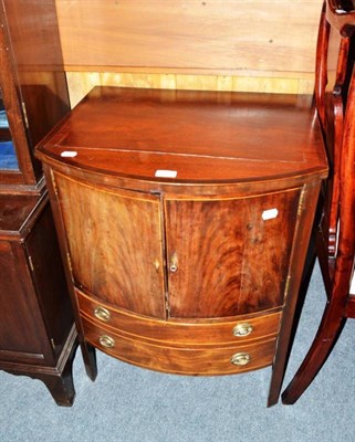 Lot 540 - A 19th century mahogany bow fronted night cupboard