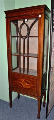 Lot 543 - An Edwardian inlaid mahogany display cabinet