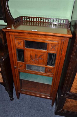 Lot 545 - A Victorian walnut music cabinet