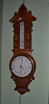 Lot 552 - An oak barometer retailed by Fattorini & Sons Bradford with silver presentation plaque