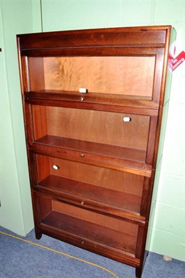 Lot 562 - A Globe Wernicke style mahogany four tier bookcase