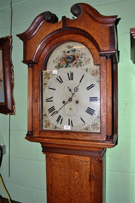 Lot 565 - An oak longcase clock with painted dial