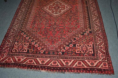 Lot 571 - Kashgai rug South West Persia, The tomato red field of Herati design centred by an ivory...