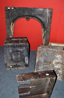 Lot 663 - An early Victorian cast iron insert and a dismantled 19th century cast iron range