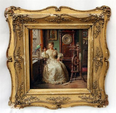 Lot 688 - Fortunino Matania RI (1881-1963) Italian A lady wearing Victorian fashionable dress seated beside a