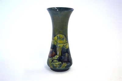 Lot 699 - A William Moorcroft Claremont Toadstool Pattern Vase, circa 1918, on a blue/green ground, impressed