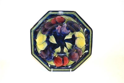 Lot 711 - A William Moorcroft Wisteria Pattern Octagonal Bowl, circa 1920's, on a blue ground with green...