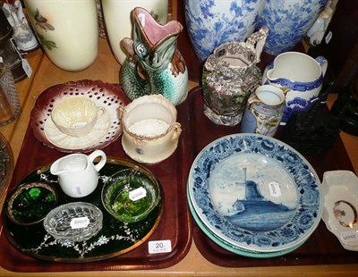Lot 20 - A cast iron money box, Majolica fish jug, and a quantity of pottery and glass etc on two trays