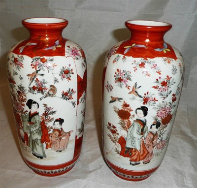 Lot 42 - A pair of Japanese Kutani vases decorated with children, signature to base (a.f.)