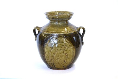 Lot 756 - Jim Malone (b.1946): A Stoneware Twin Lug Handled Vase, green ash glaze, sgraffito decorated to...