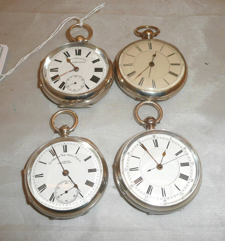 Lot 75 - Two silver chronograph pocket watches and two other silver open faced pocket watches, all with...