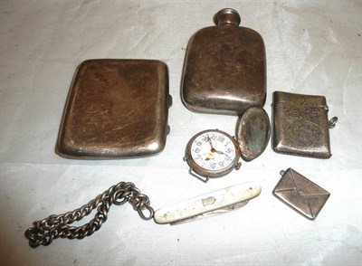 Lot 76 - A small silver hip flask, cigarette case, fruit knife, military watch, vesta case and stamp...