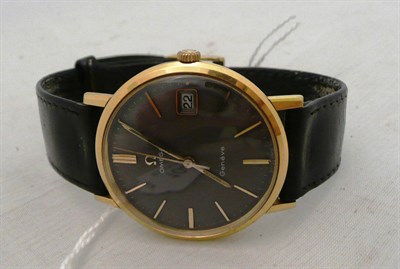 Lot 104 - A steel and gilt gents Omega wristwatch