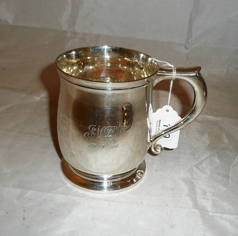 Lot 119 - A silver baluster mug