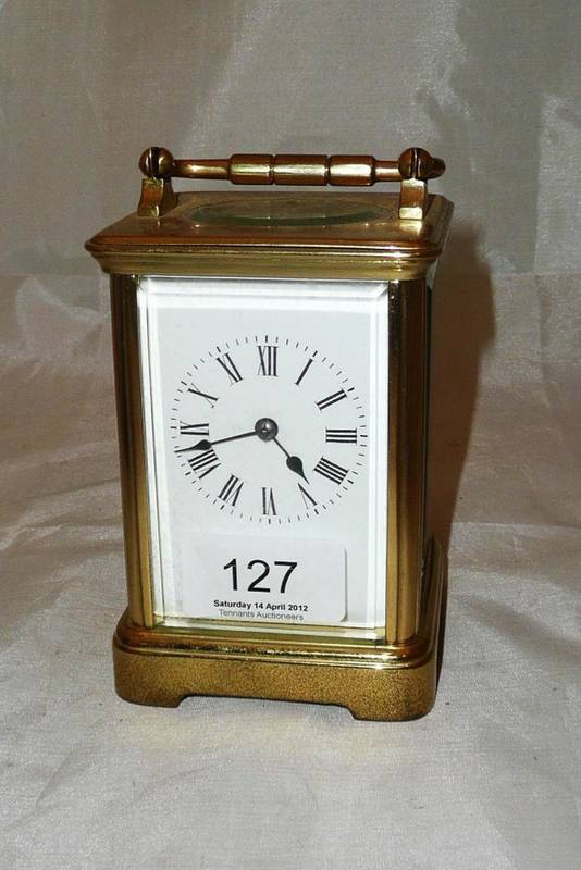 Lot 127 - A brass carriage clock