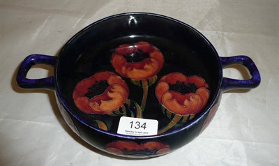 Lot 134 - William Moorcroft 'Big Poppy' twin-handled bowl (restored)