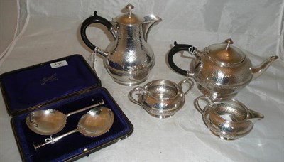 Lot 137 - A cased pair of silver spoons and a four piece pewter tea set