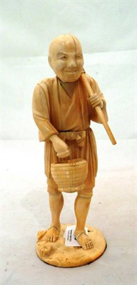Lot 139 - 19th century Japanese ivory figure with stick (base not attached)