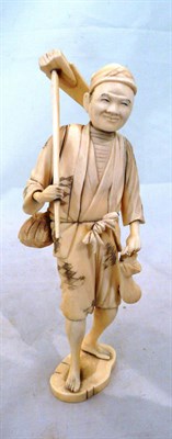 Lot 140 - 19th century Japanese ivory figure of a farmer with stick (base not attached)