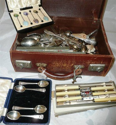 Lot 151 - A set of six enamel coffee spoons, four silver teaspoons and a quantity of electroplate and tea...