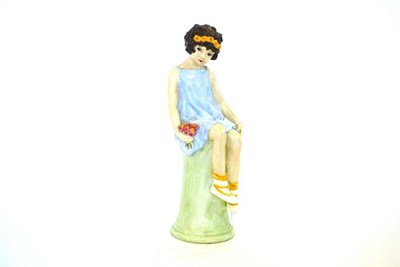 Lot 765 - A Wedgwood Bone China Figure, by Kathleen H.M. Goodwin (1902-1976), modelled as a girl sat on a...