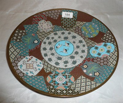 Lot 184 - A Chinese cloisonne plate decorated with cranes and turtles