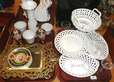 Lot 187 - Victorian brass wall mirror, white porcelain centrepiece, low stand and two baskets, six...